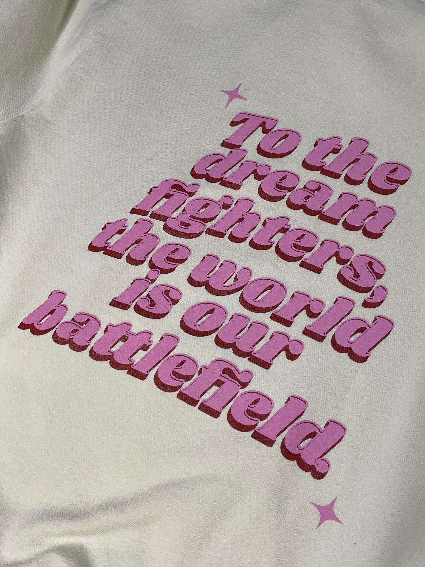 Cream "Feel Human" hoodie.